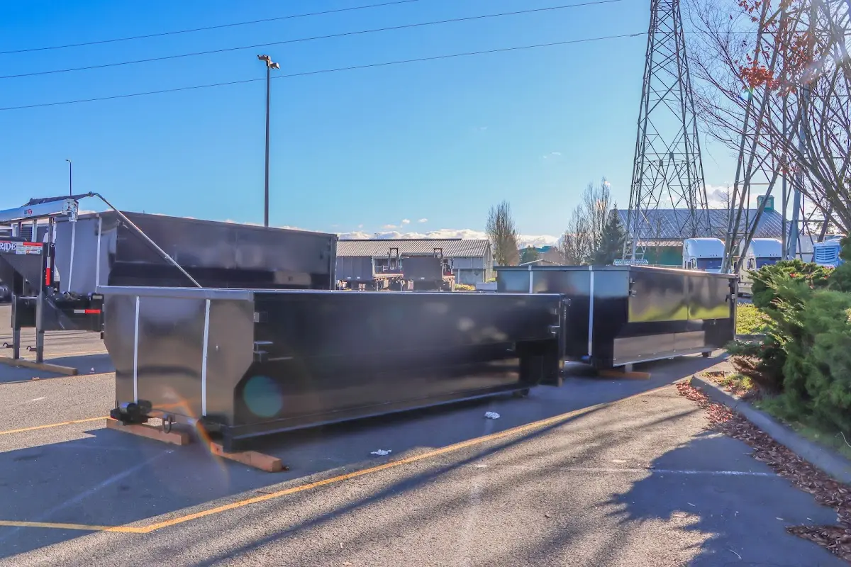 Roll-off dumpster ready for waste disposal at job site for Roll Off Dumpster Rental in Millbury